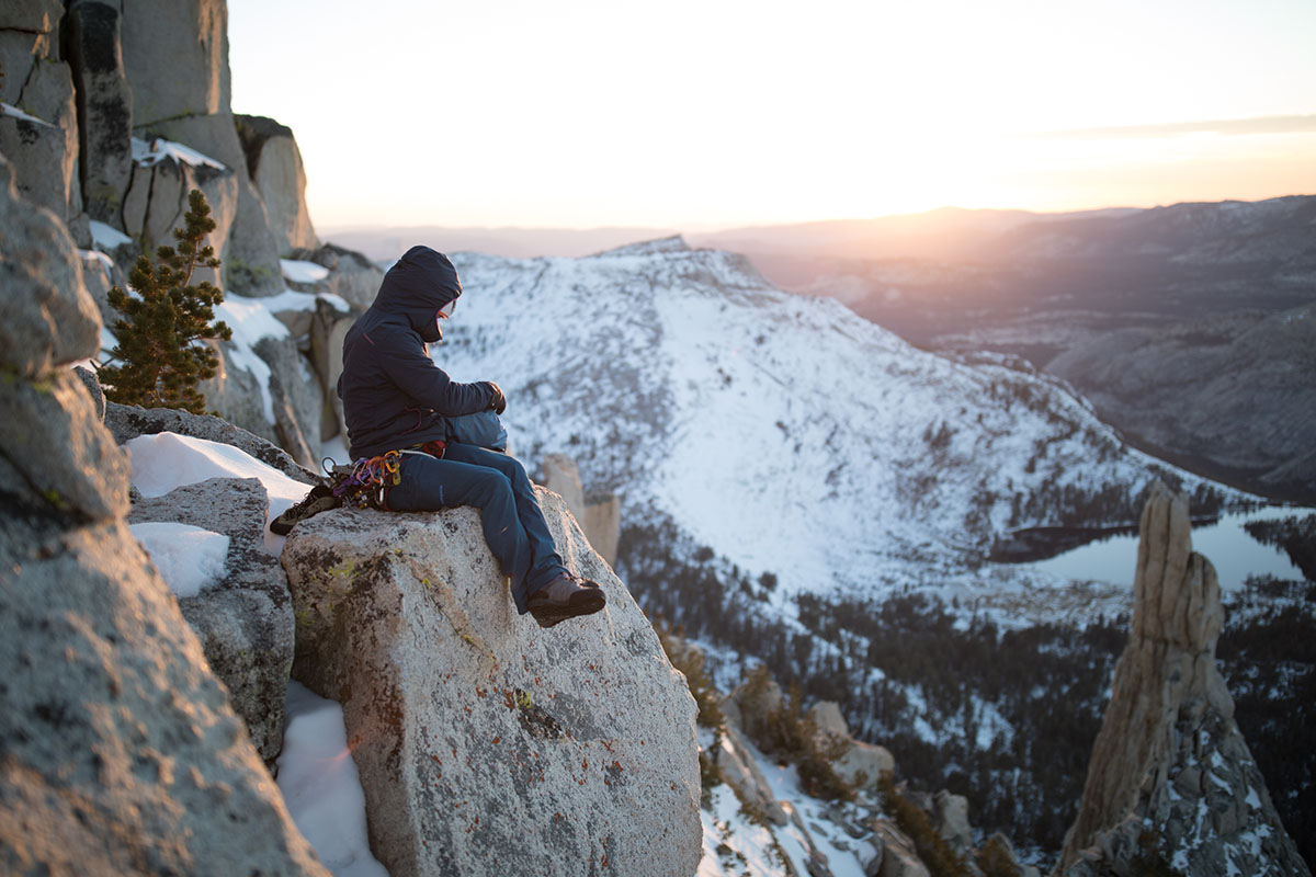 Approach shoes (sitting on rock in snowy mountains)